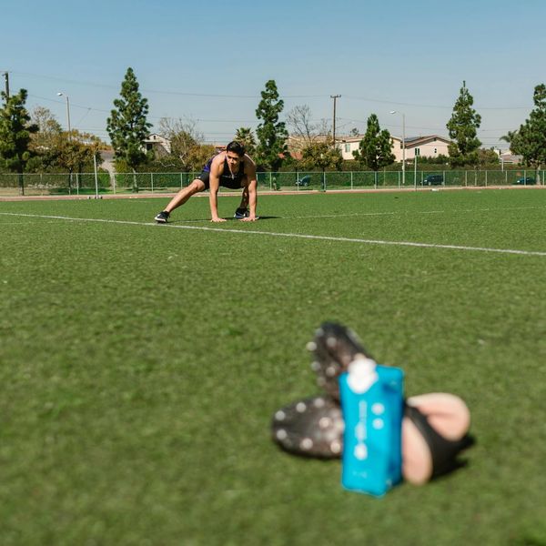 A calm and focused man preparing for his exercise routine.